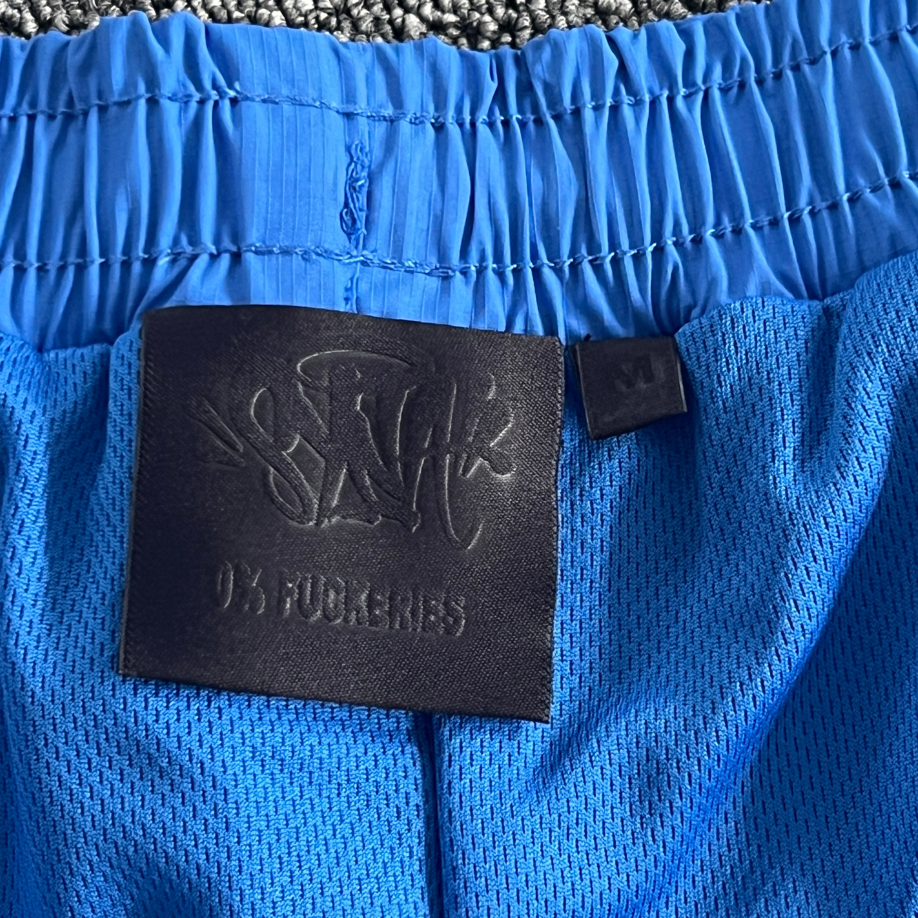 SYNA VORTEX TRACK SHORT- BLUE & YELLOW