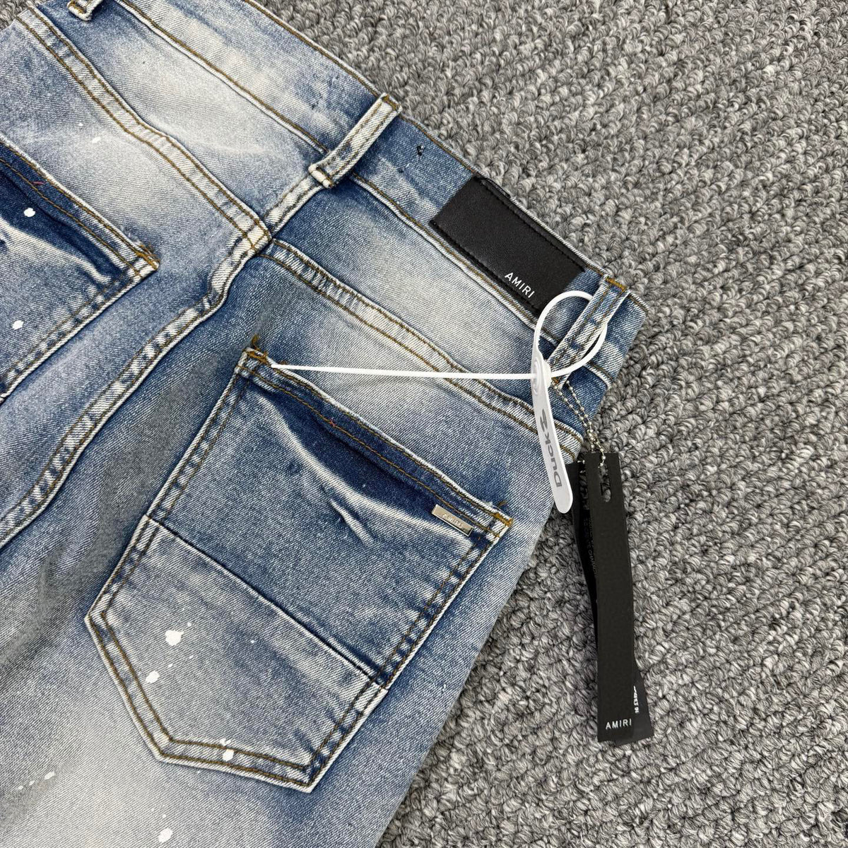 AMlRI BLUE BADGES JEANS
