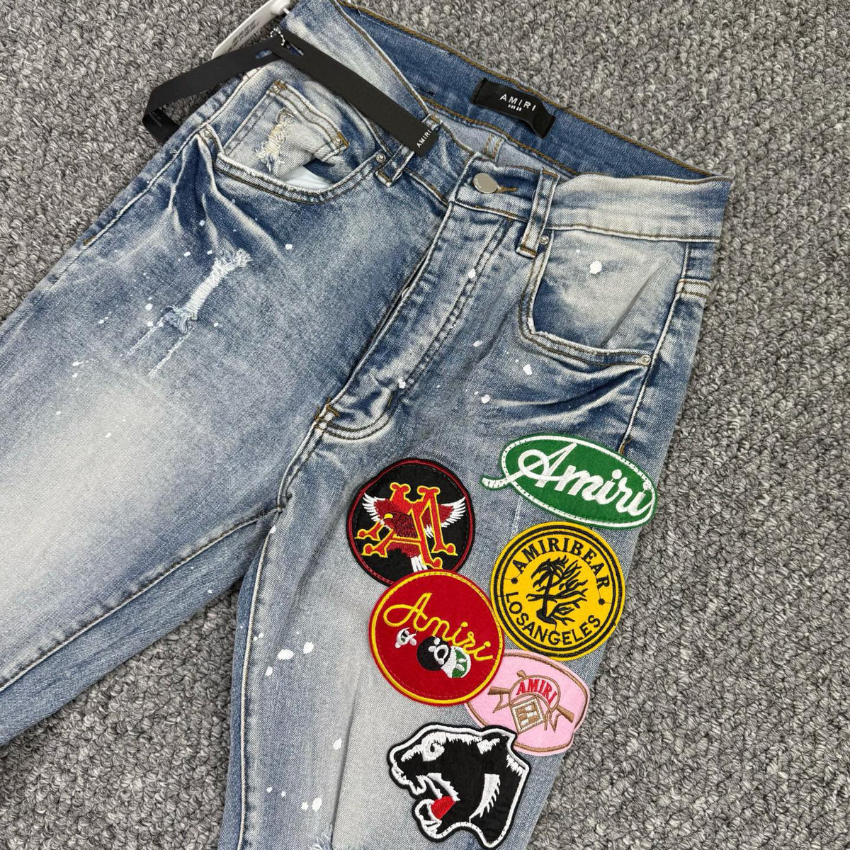 AMlRI BLUE BADGES JEANS