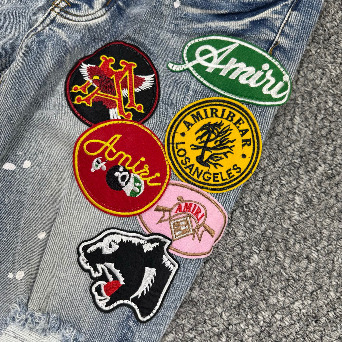 AMlRI BLUE BADGES JEANS