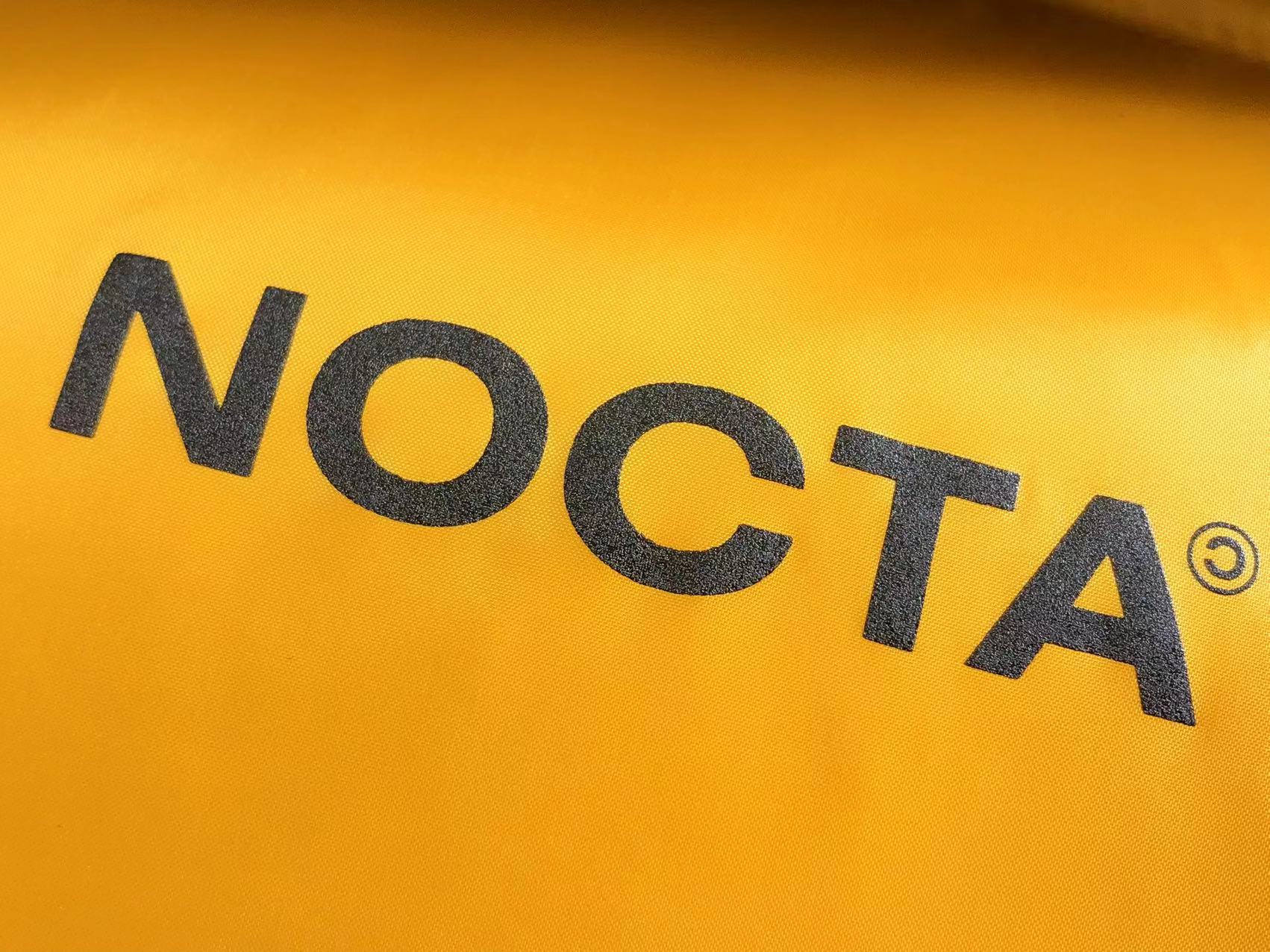 NOCTA Yellow Puffer Jacket