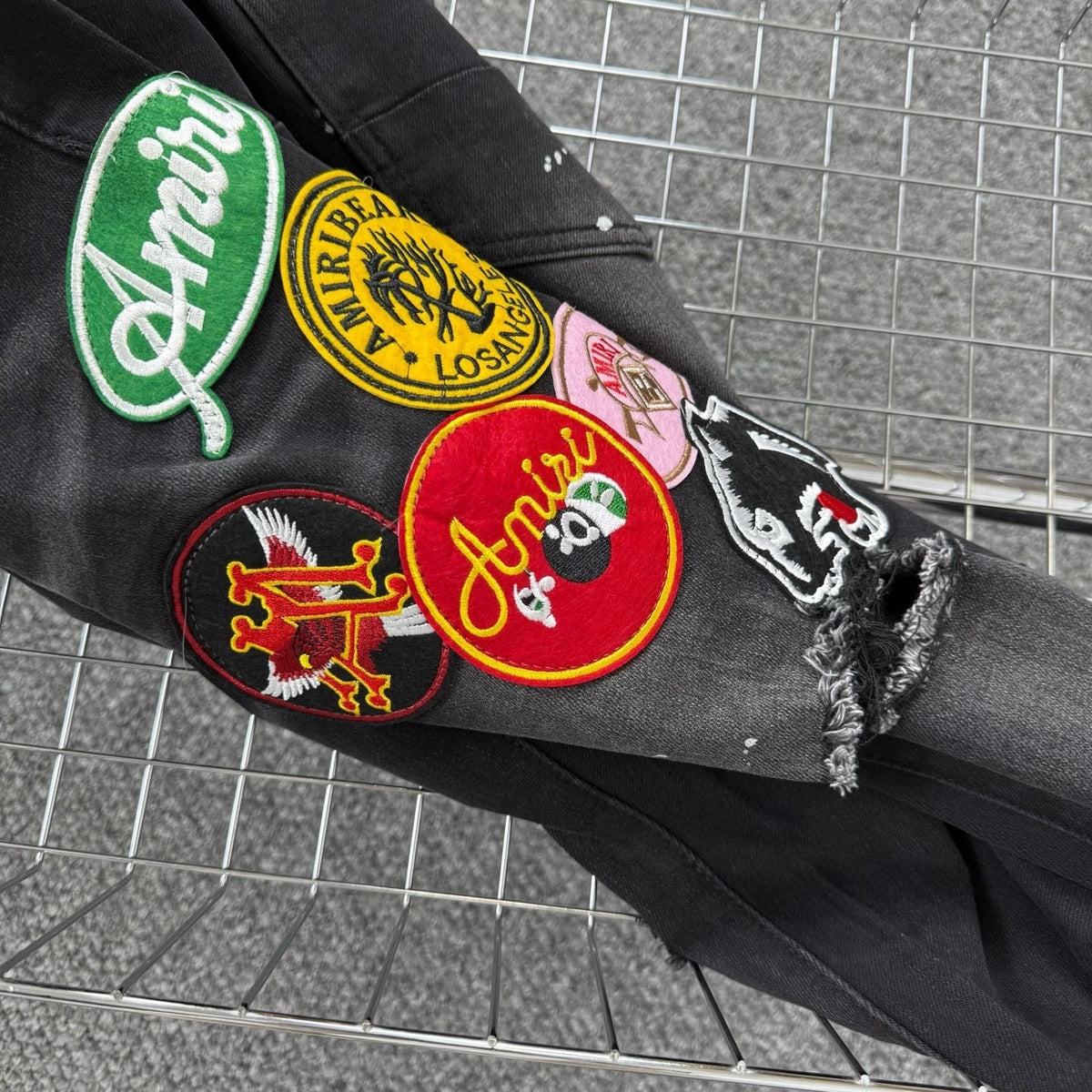 AMlRI BLACK BADGES JEANS