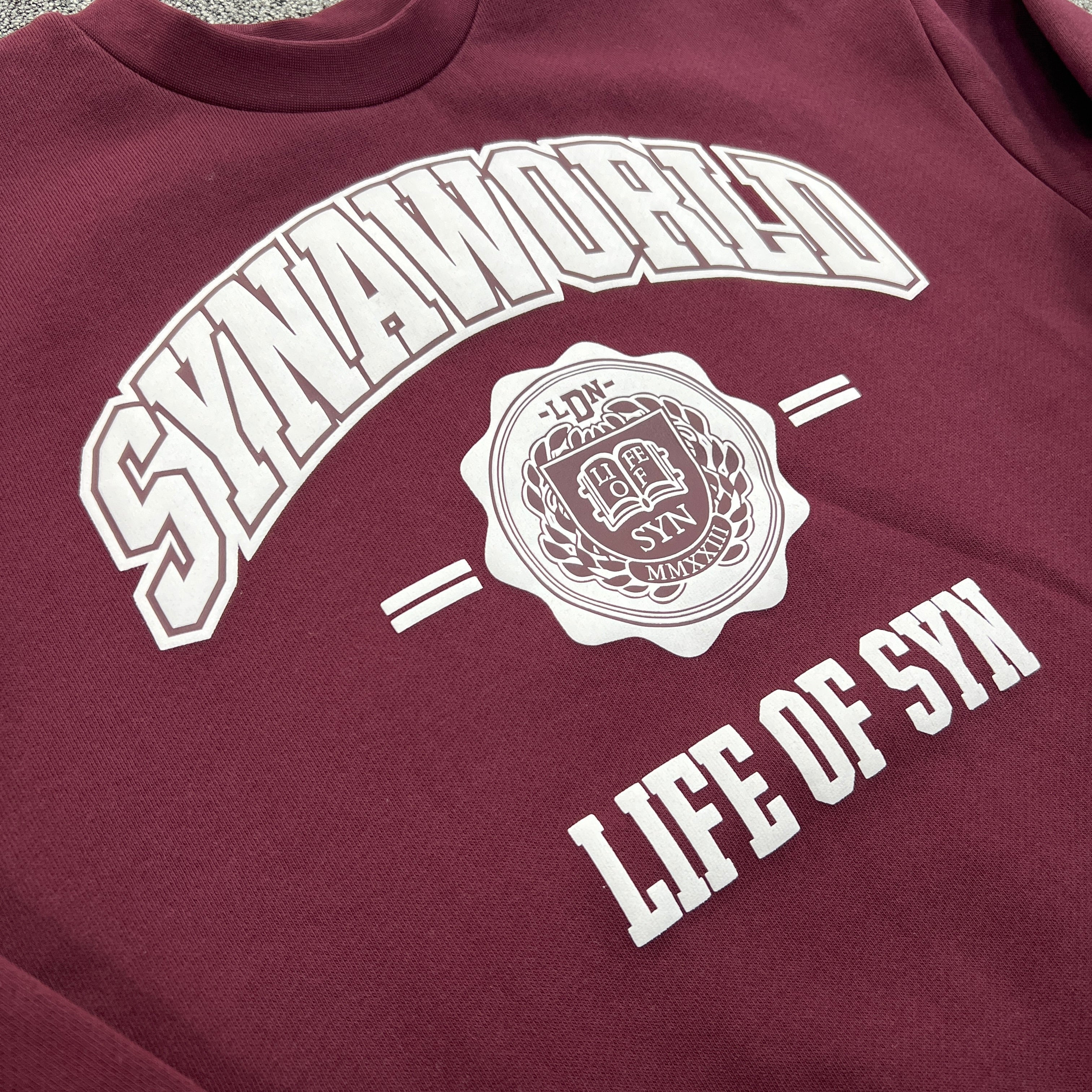 SYNA LONG SLEEVE VARSITY CREW SWEAT- MAROON