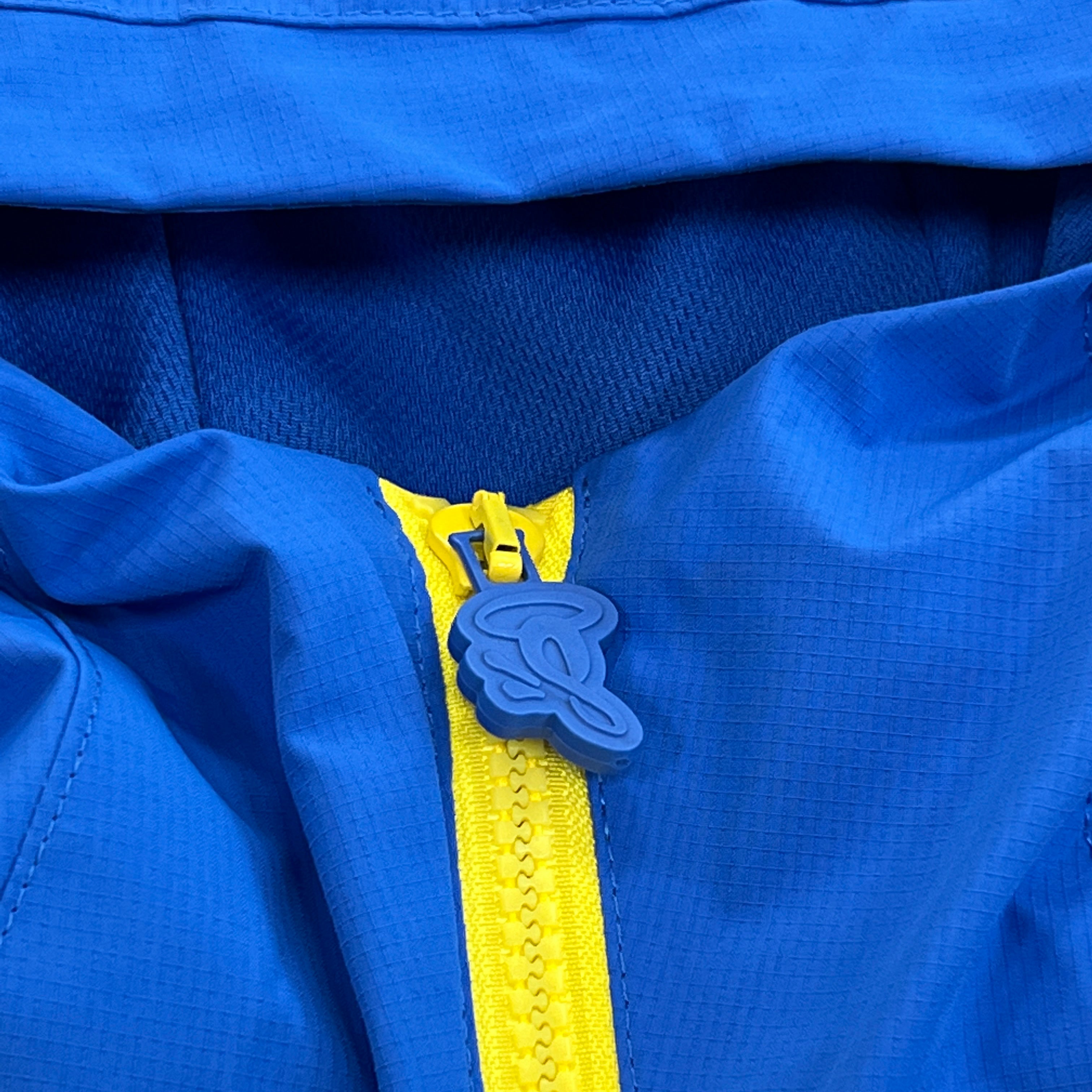 SYNA VORTEX TRACK TOP- BLUE & YELLOW