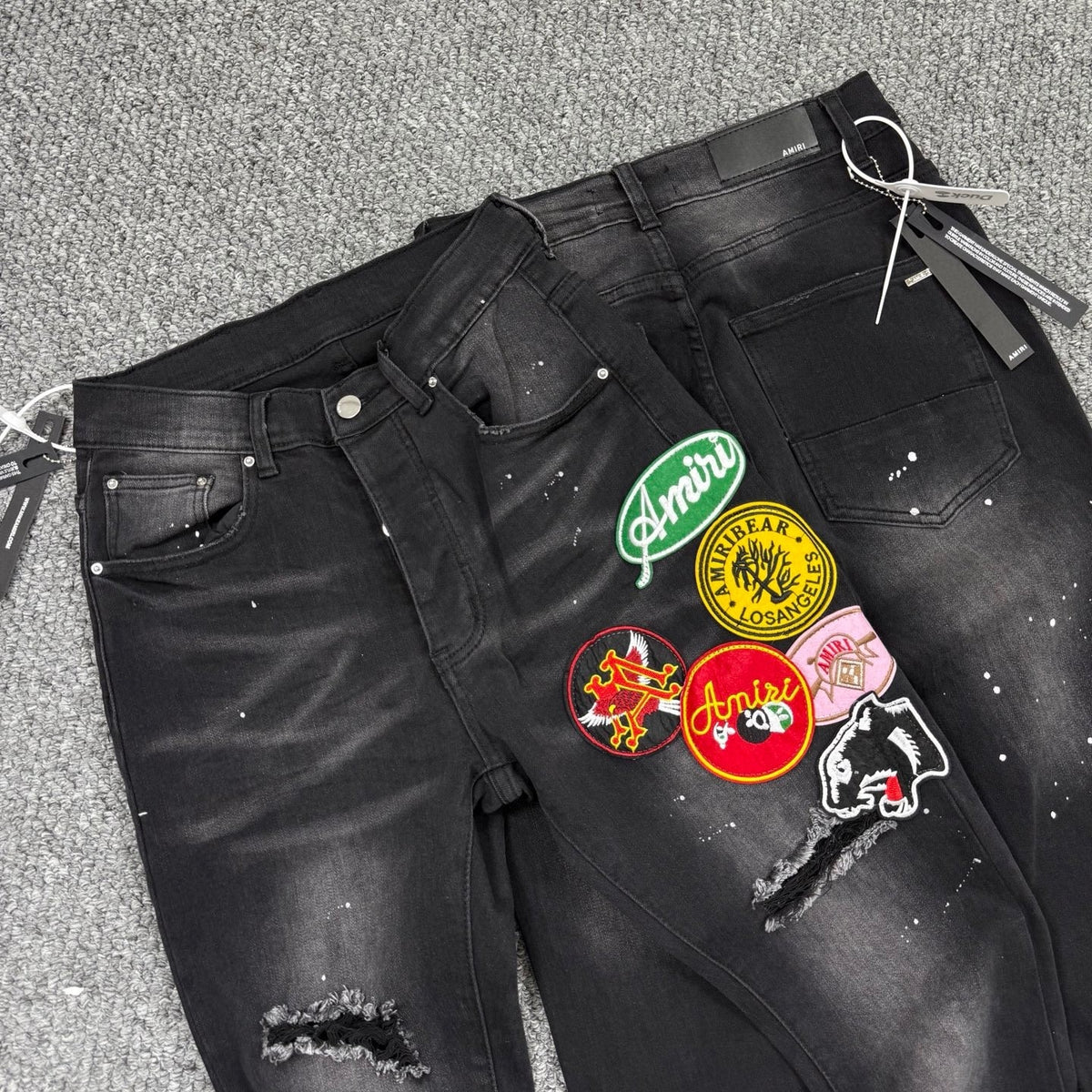 AMlRI BLACK BADGES JEANS