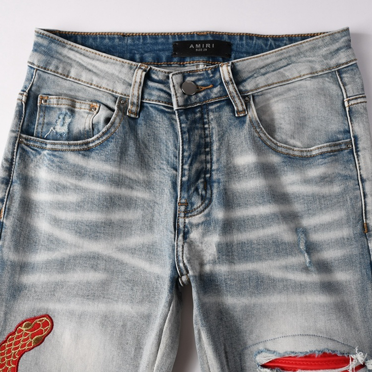 RED JEANS BLACK SNAKE